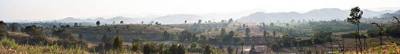 Panoramic view - looking towards the southwest - of the western edge of the Khun Tan range; as seen from road 109, January 2014. This image was created with…