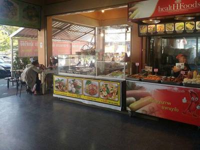 Food and drinks selling point inside the new building of the Arcade Bust station in Chiang Mai.