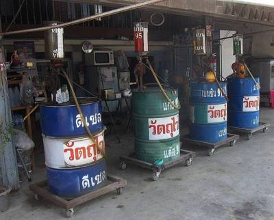 This type of shop is common in rural Thailand and perhaps in other parts of the world. It provides fuel that is typically hand-pumped from barrels or drums…