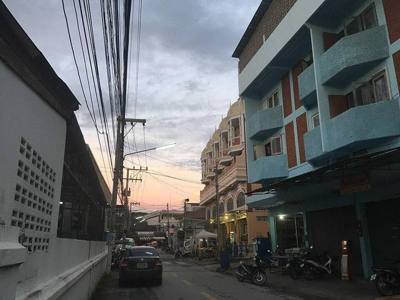 View of the Charoen Prathet 13 Road in Chiang Mai at sunset.