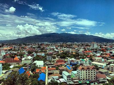 Looking over the Chiang Mai city area and Doi Suthep mountain nearby.