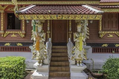 Door at the Viharn of the Wat Ming Mueang, Bap Prakan Road, Chiang Rai , Thailand
