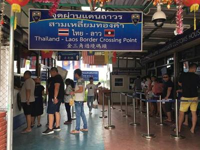 Chiang Saen Immigration Thailand-Laos Crossing Checkpoint at Sop Ruak, queue to exit Thailand to get to the Golden Triangle Special Economic Zone in Laos.