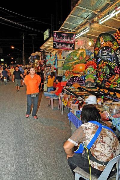 Walking back to the hotel we went along the Night Bazaar area on Chang Klan Road. Various shops and products from many places in Thailand. The Night Bazaar…