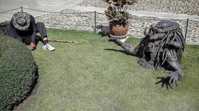 500px provided description: Before entrusting an alien with some work ? you might as well do it yourself. photography #apprentice #trainee #alien#gardener…