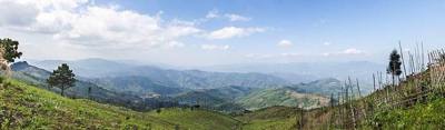 Looking out over Tachileik District, Shan State, Burma, into the heart of the Daen Lao Range from Thai road number 1149 in Mae Sai District, which runs…