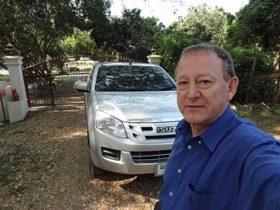 Isuzu and me at the gated entrance to home
