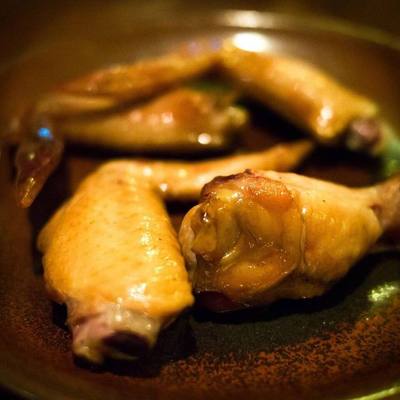 Kai rom khwan (Thai script: ไก่รมควัน) is Thai style smoked chicken. Chicken wings are usually used for this dish. It is most often eaten as a snack.