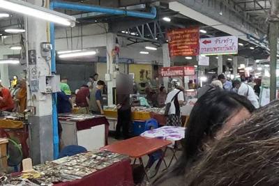Monks browse the amulet tables. In the amulet hall of Kamthieng market (ตลาดคำเที่ยง), beside Lotus's Kamthieng and Jing Jai Market, Pa Tan, Mueang Chiang…