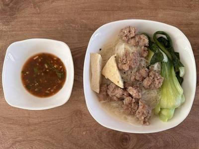 Kyay-Oh rice vermicelli soup with pork, famous dish from Myanmar.