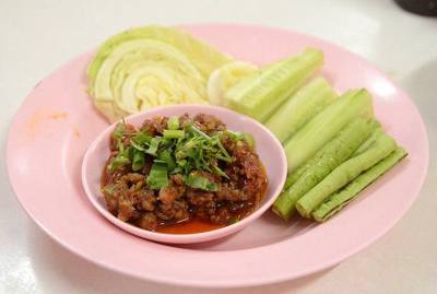 Nam phrik ong (Thai script: น้ำพริกอ่อง): A Northern Thai chilli dip with minced pork and tomato. Best described as a spicy Bolognese sauce, it is served…