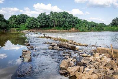Local rock weir on Ping River at Chiang Mai.