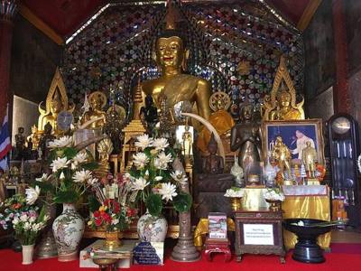 Statues of the Buddha at Wat Phra That Doi Suthep in Chiang Mai.