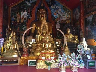 Statues of the Buddha at Wat Phra That Doi Suthep in Chiang Mai.
