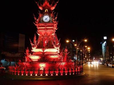 Clock tower in Chiang Rai at night, with red light
