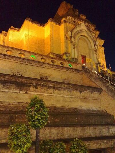 Wat Chedi Luang lit at night during Tam Boon Khan Dok
