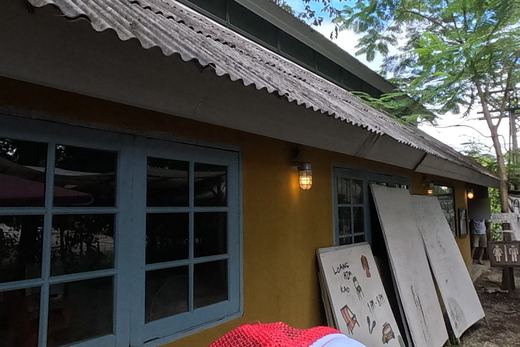 Yellow house with blue windows — Chamcha Market, San Kamphaeng