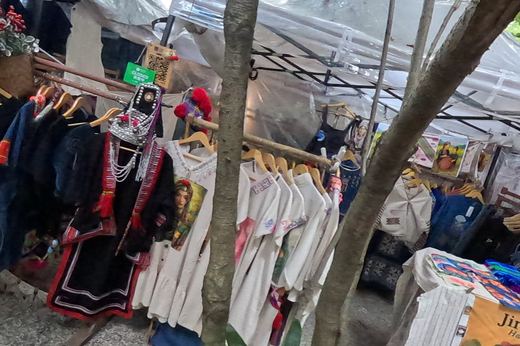 Jira: portrait prints and an Akha jacket — Chamcha Market, San Kamphaeng