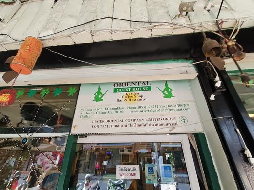 Oriental Guest House's sign at 69 Loi Kroh: garden, coffee shop, bar & restaurant