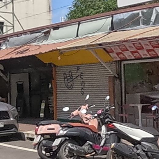 Small tag with a cartoon hand