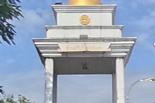 Gold-spired memorial pavilion by the underpass