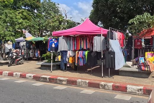 Clothing stalls under pink tents