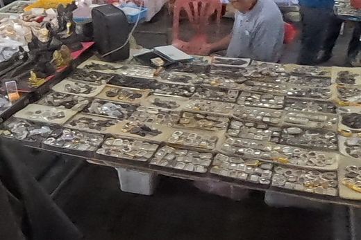 Coin amulets in rows