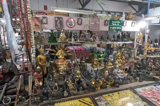 A Buddha image stall in the amulet market