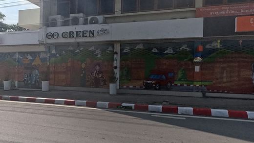 Lanna street-life mural on shop shutters