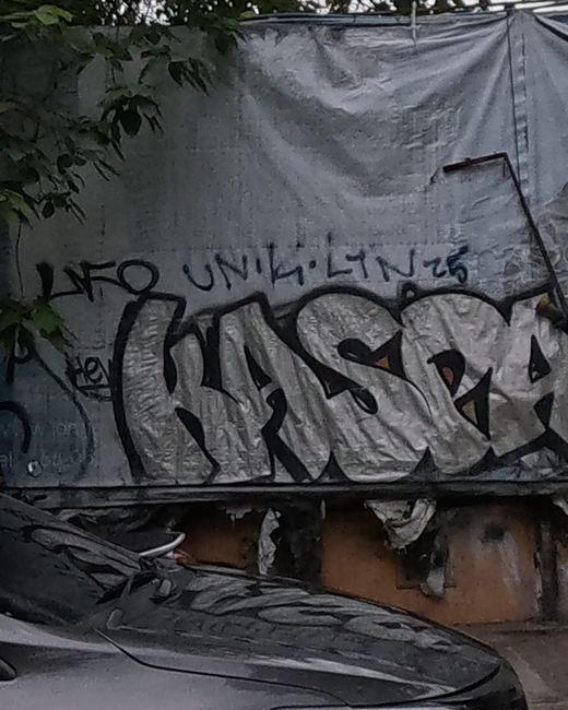 Construction hoarding graffiti: KASPA/WASPA throw-up and tags