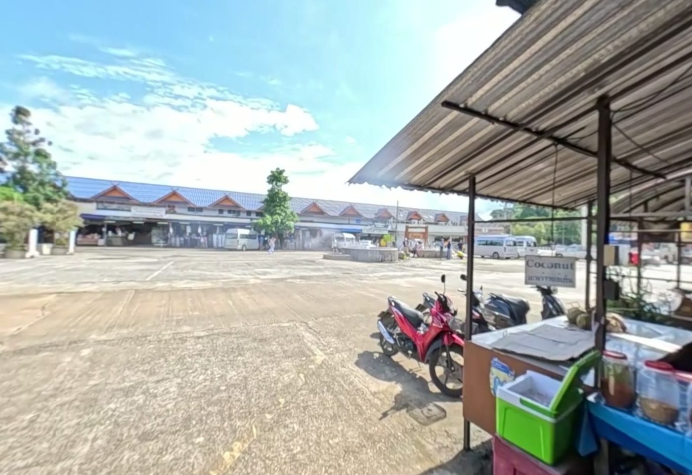 Car park, geyser and the Coconut stall