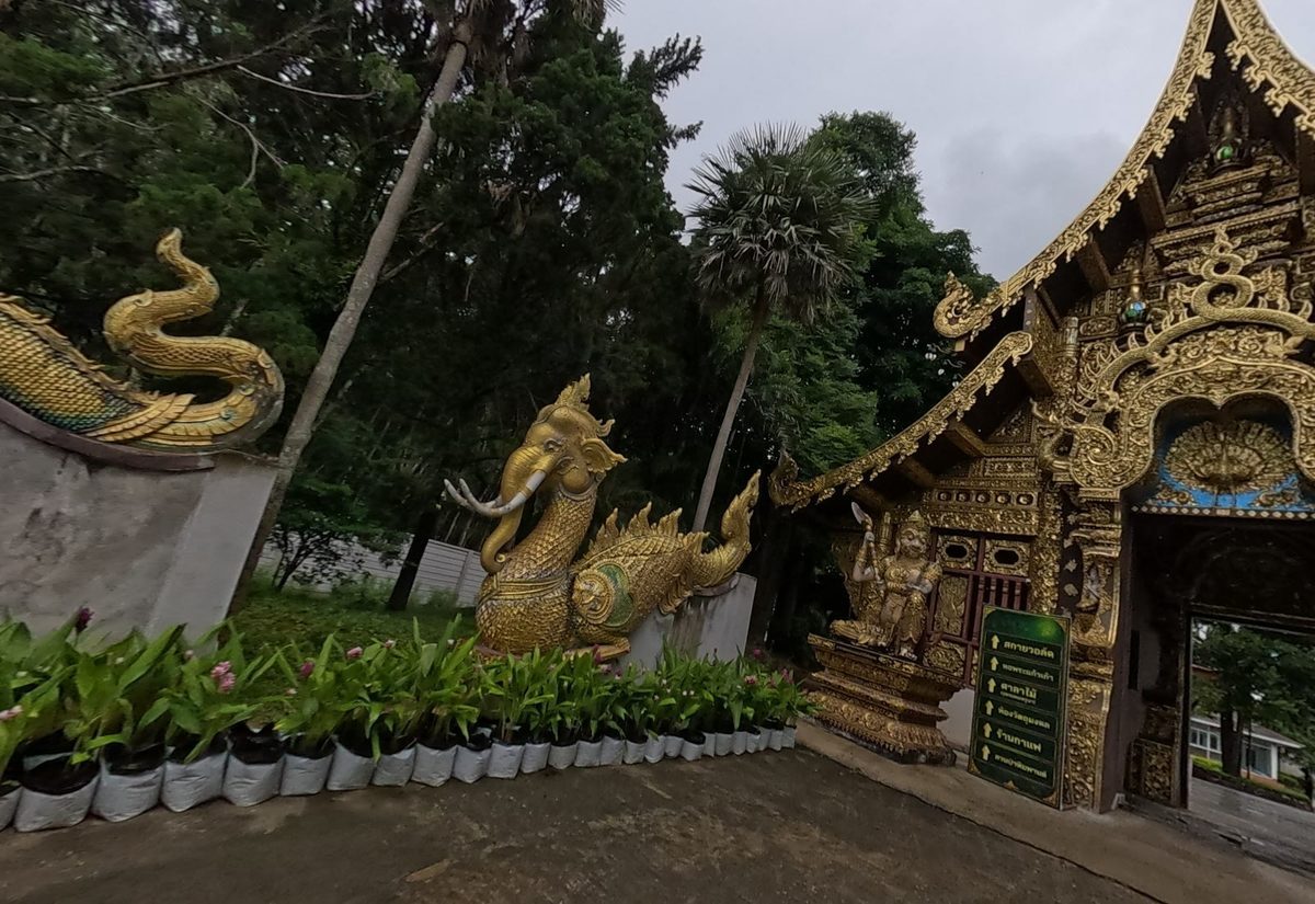Gilded Lanna gate with elephant-naga (hatsadiling) and guardian