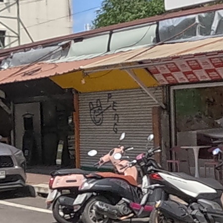 Small tag with a cartoon hand
