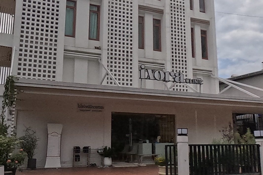 A tall skin and laser clinic building at the corner of a side street.
