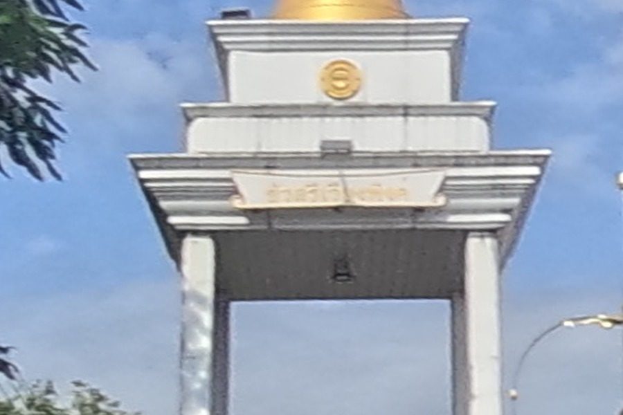 Gold-spired memorial pavilion by the underpass