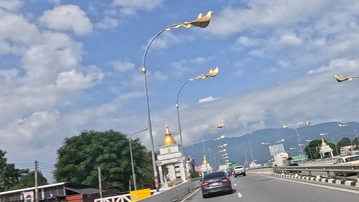 White and gold gate pavilions on the ring road