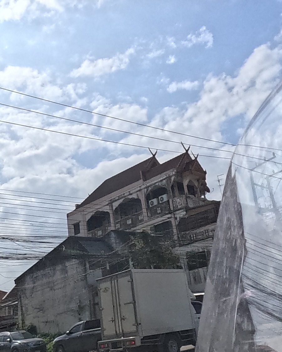 Ornate Lanna-roofed mansion