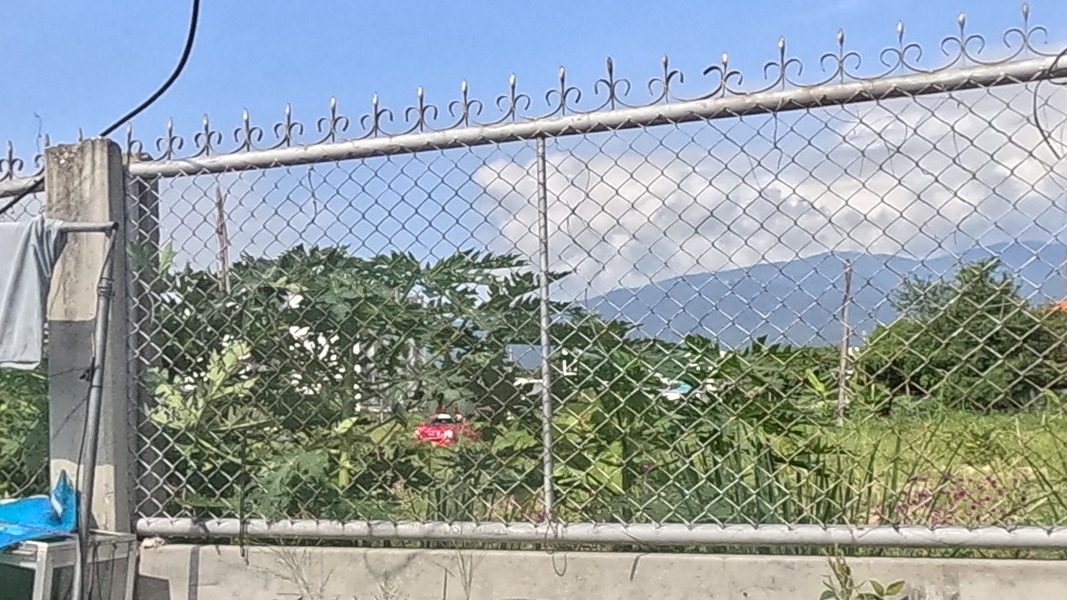 Mountains beyond a vacant lot
