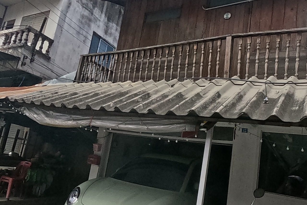 Old teak house with carved balcony