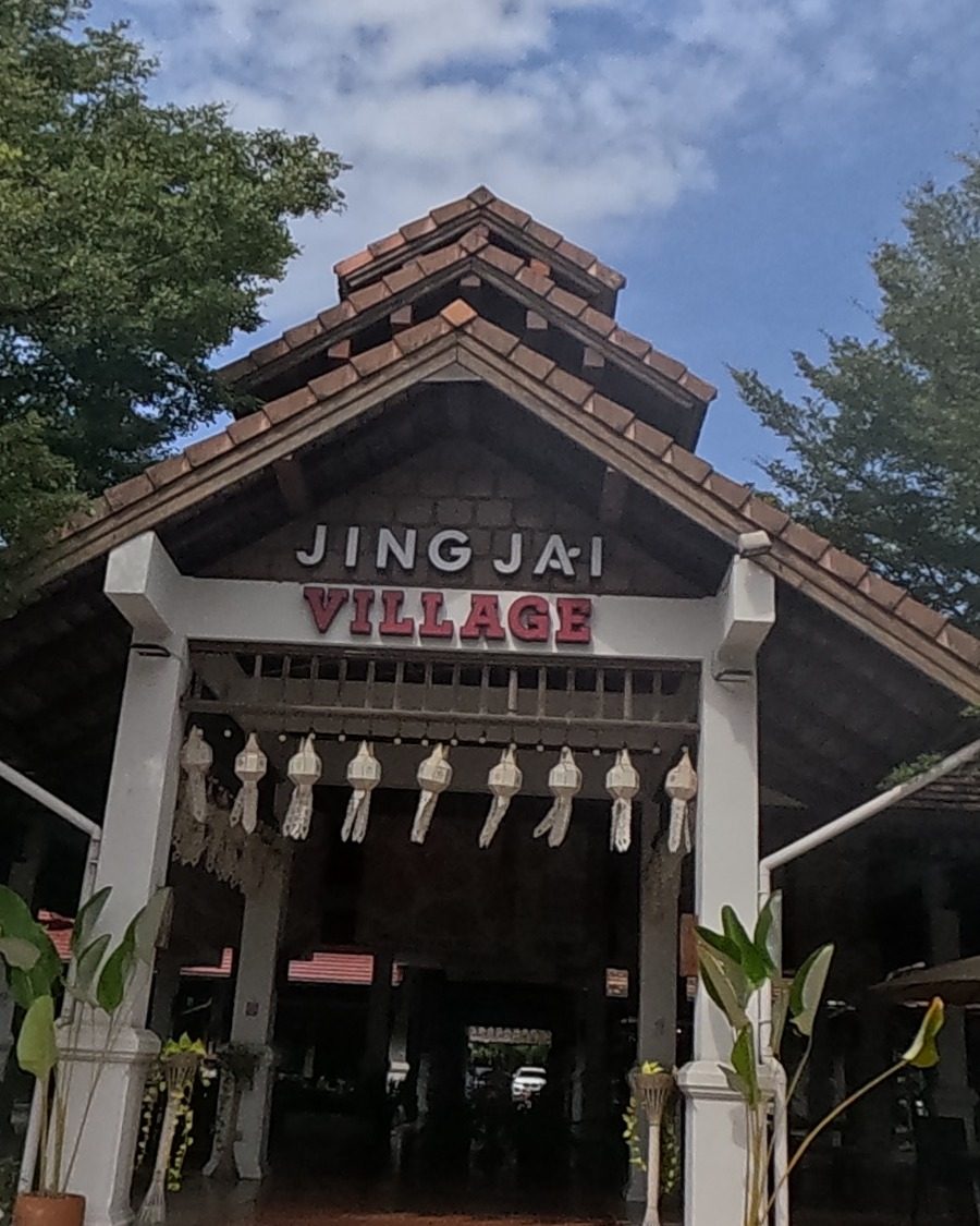Jing Jai Village teak gateway