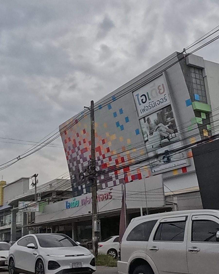 Pixel-art mural on a furniture store