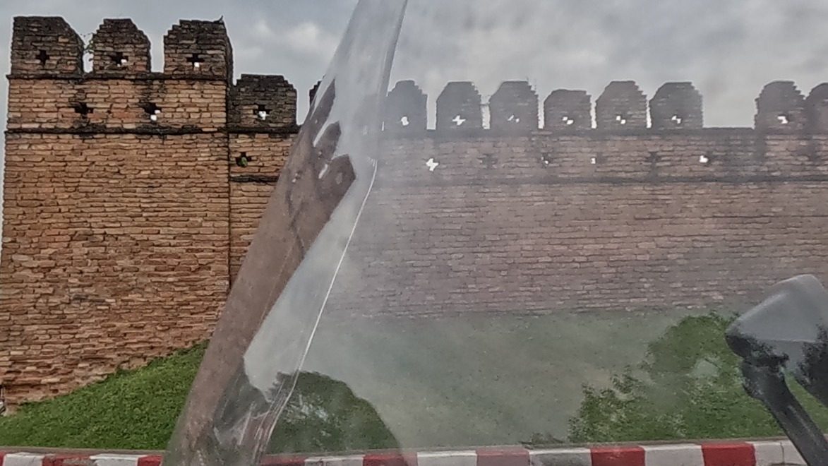 Suan Dok Gate's crenellated brick wall