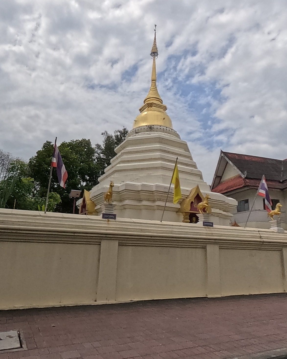 White chedi with gold spire