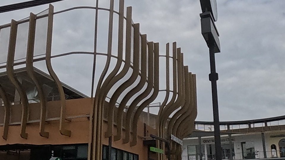 Wave-roofed Backyard complex