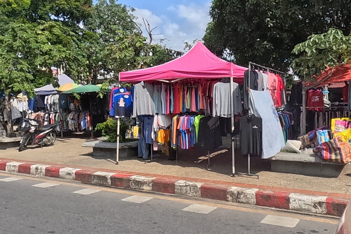 Clothing stalls under pink tents