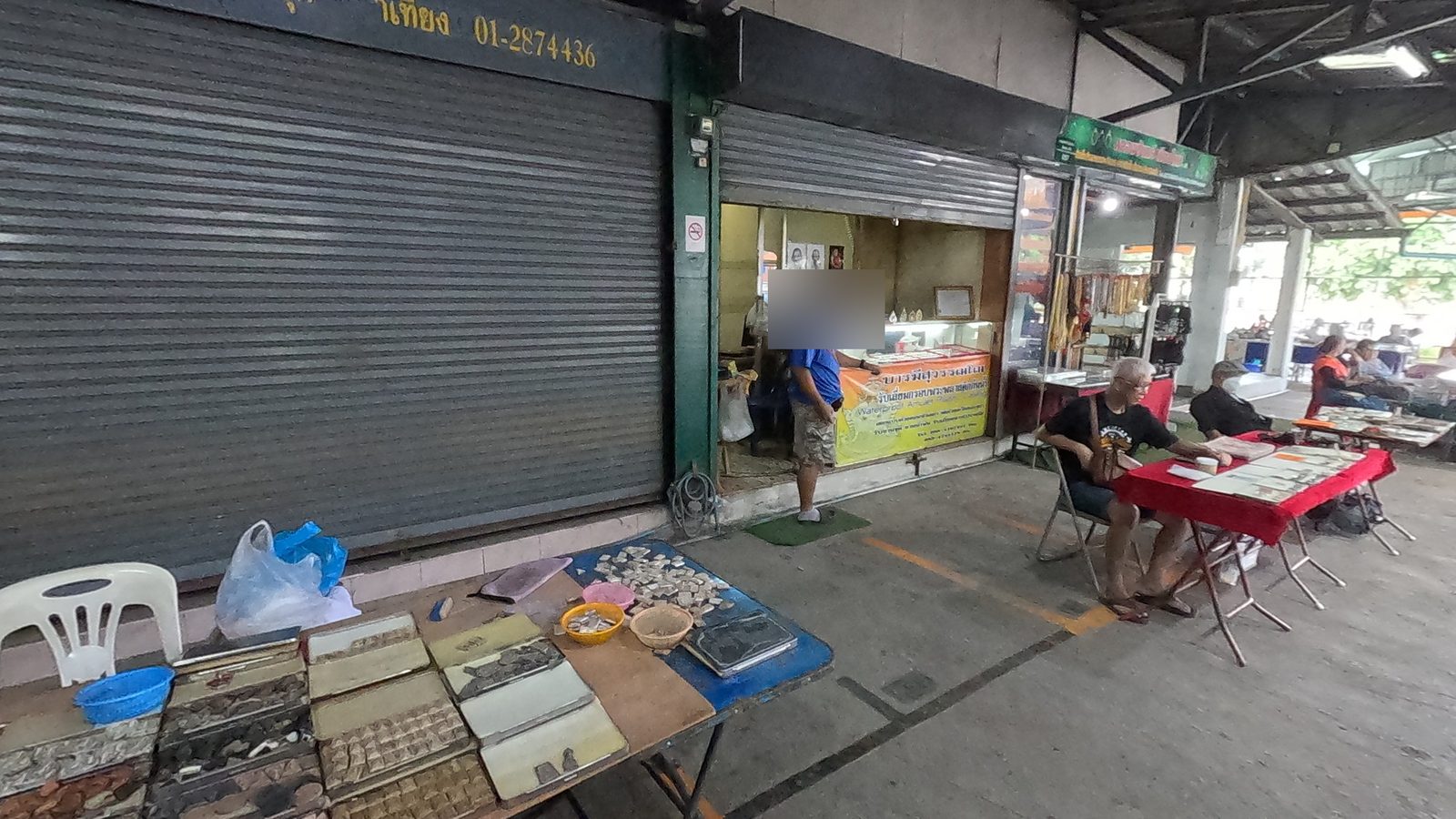 Amulet shops along the market wall