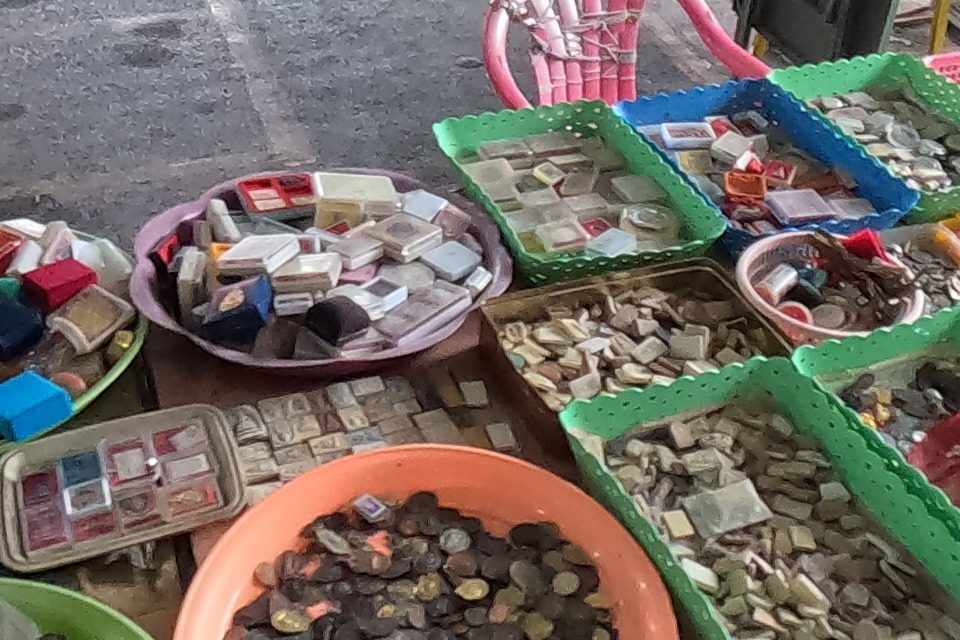 Baskets of boxed and loose amulets
