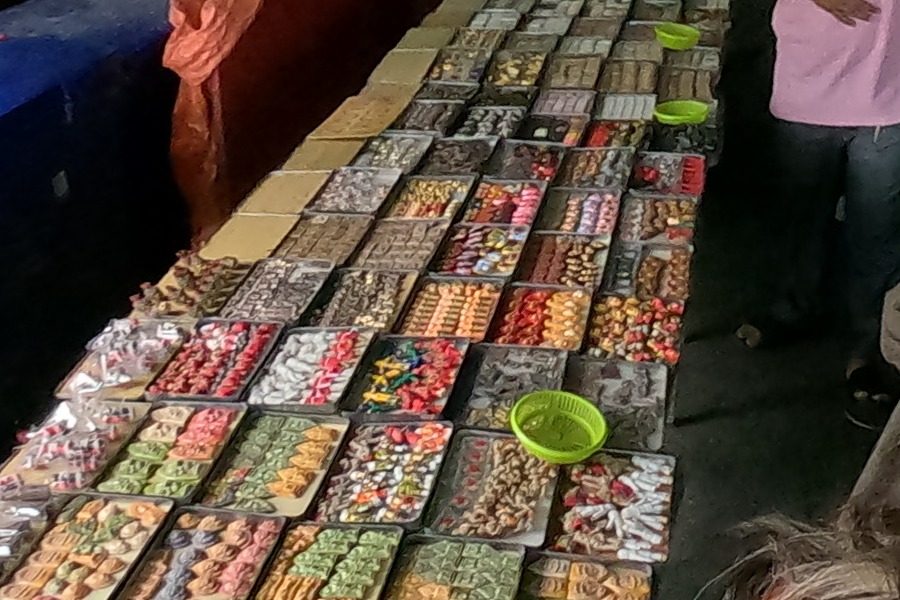 Trays of colourful cased amulets