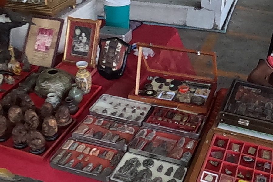 Trays of small amulets and figures