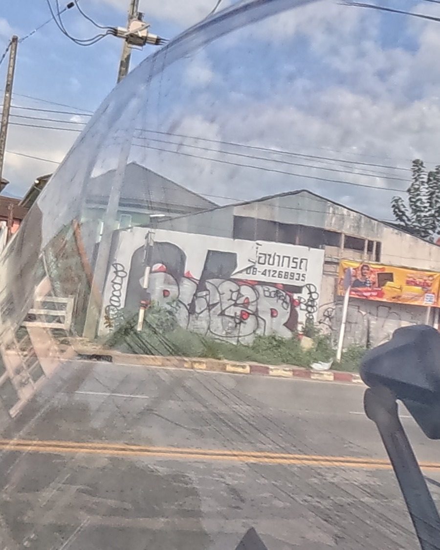 Bubble tag on wall by repair shop